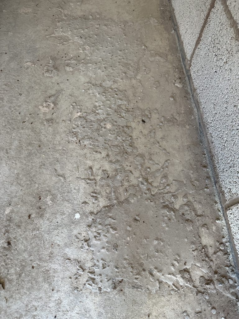 Concrete splashed over the carport floor - Peveril Homes