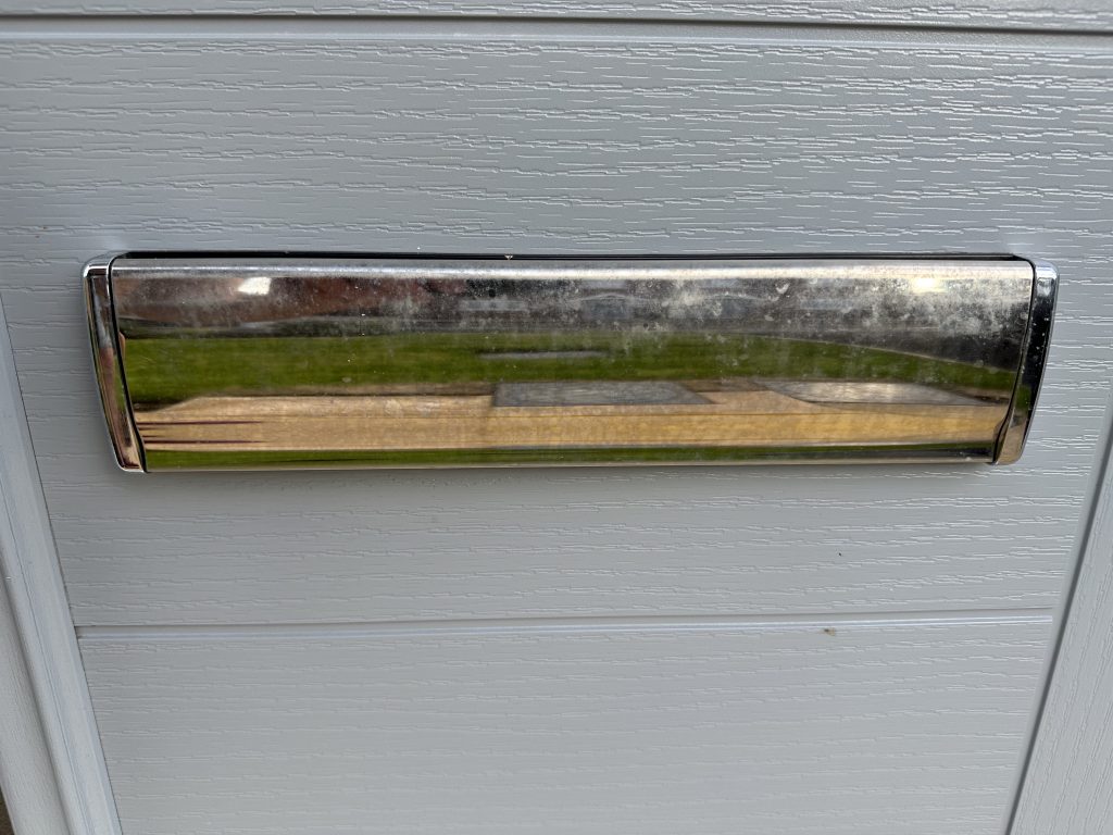 tarnished door handle from brick acid